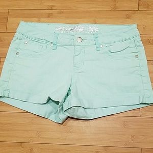Express cuffed seafoam denim shorts